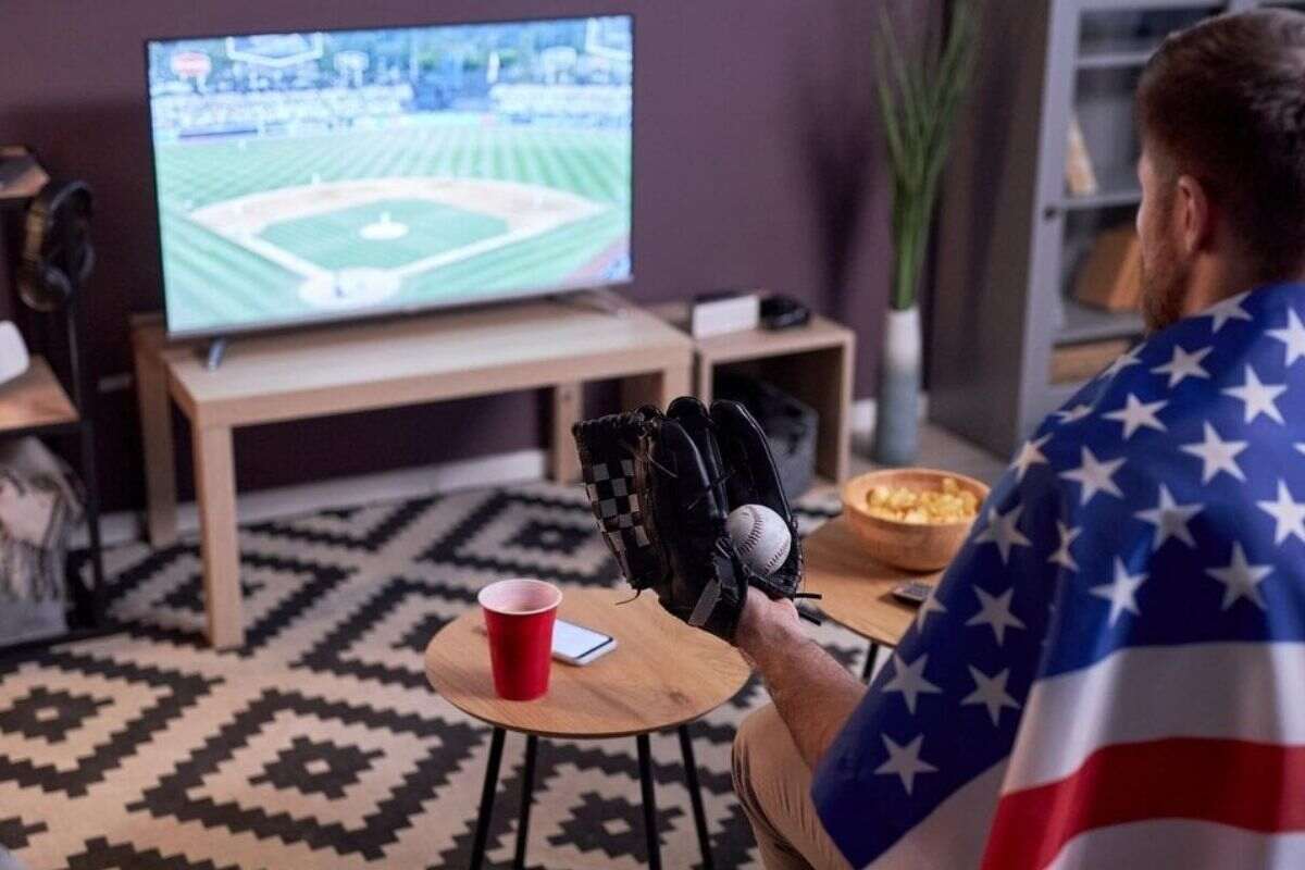 User watching IPTV on smart TV in a Dubai home. 