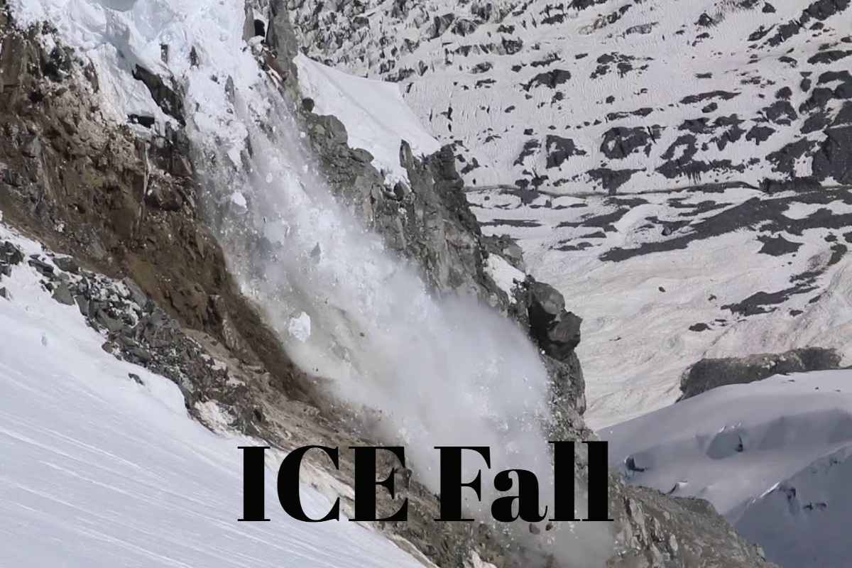 ICE Fall cascade over snowy cliffs, winter nature scene.